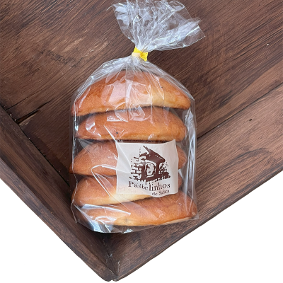 Pacote de cinco pastelinhos de Sáfara embalados em plástico transparente com etiqueta branca.