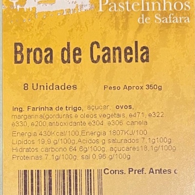 Etiqueta amarela de Broa de Canela da Tradição Alentejana com texto e código de barras.