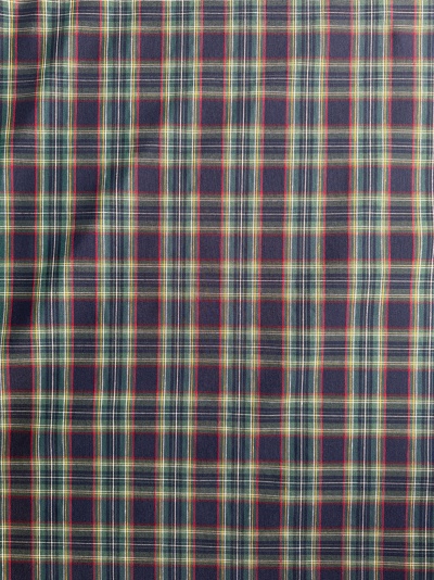 Tecido xadrez em azul escuro, verde e vermelho