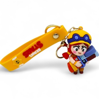 Porta-chaves amarelo com personagem de capacete azul e roupa vermelha