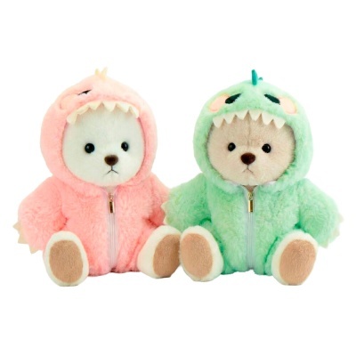 Dois ursos de peluche com fatos de monstro rosa e verde
