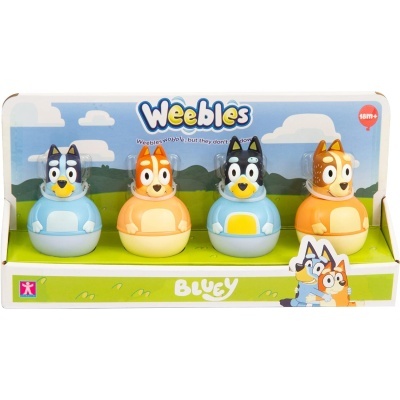 Conjunto de quatro brinquedos Weebles de cães coloridos em caixa