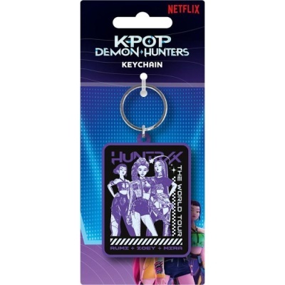 Porta-chaves KPOP Demon Hunters com ilustração de três personagens femininas e texto promocional.