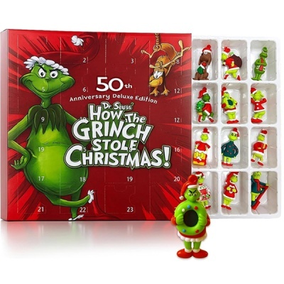 Calendário de advento do Grinch com figuras plásticas coloridas e caixa vermelha com texto branco.