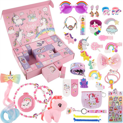Conjunto de acessórios infantis com embalagem rosa e tema de unicórnios e arco-íris.