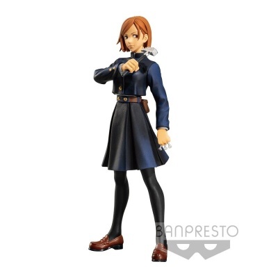 Figura colecionável de personagem feminina com roupa azul e preta em fundo branco.