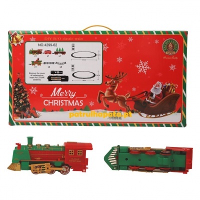Comboio de brinquedo verde e vermelho com embalagem de Natal