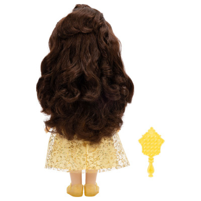 Boneca com cabelo escuro encaracolado e vestido amarelo, com pente amarelo ao lado