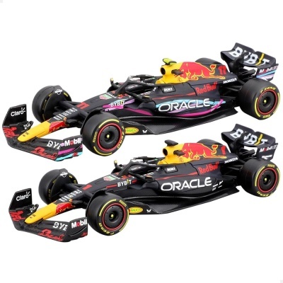 dois carros de Fórmula 1 em miniatura preto e amarelo com logos Red Bull e Oracle