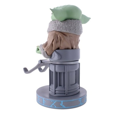 Figura de Yoda sentado numa cadeira com base redonda azul