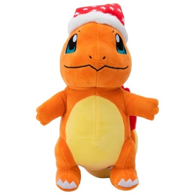 Peluche de personagem laranja com barriga amarela e chapéu de Natal vermelho