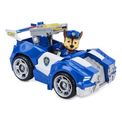Carro de brinquedo azul e branco com figura de cão policial sentado