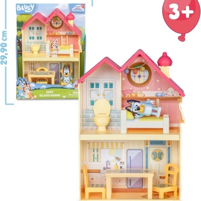 Casa de brincar infantil miniatura com móveis e decoração colorida.