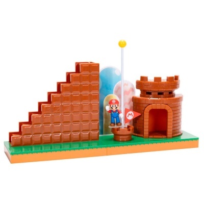 Figura colecionável de Mario com castelo e escada castanha de blocos, bandeira vermelha e globos azuis.
