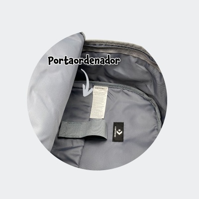 Interior de bolsa cinzenta com compartimento 'Portaordenador' e etiqueta