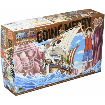 Caixa da coleção de moedas One Piece com o navio Going Merry e o personagem Luffy