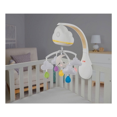 Mobile de berço branco com nuvens e gotas coloridas penduradas