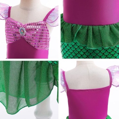 Fantasia colorida para criança com rosa e verde, tecidos brilhantes e tule em manequim.