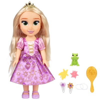 Boneca loira com vestido roxo e acessórios incluindo sapo, presilhas, elásticos e pente