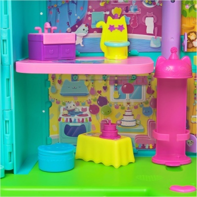 Brinquedo de cozinha infantil colorido com pia, privada, mesa com bolo, banco e coluna cor-de-rosa