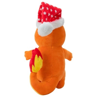 Pelúcia laranja com chapéu de Natal vermelho e branco vista de costas