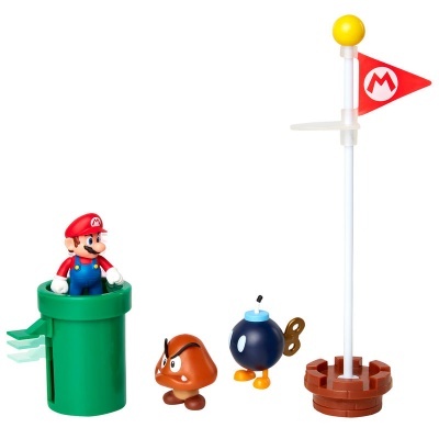 Figuras de brinquedo de Super Mario com Mario em cano verde, Goomba castanho, bomba azul e mastro com bandeira vermelha