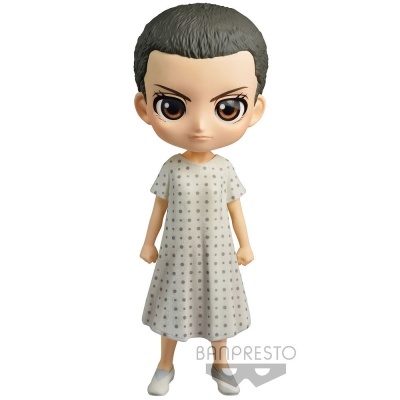 Figura de ação com vestido branco e cabelo curto