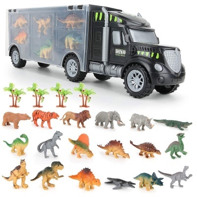 Camião preto de brinquedo com dinossauros em compartimentos transparentes e miniaturas de dinossauros e árvores ao redor