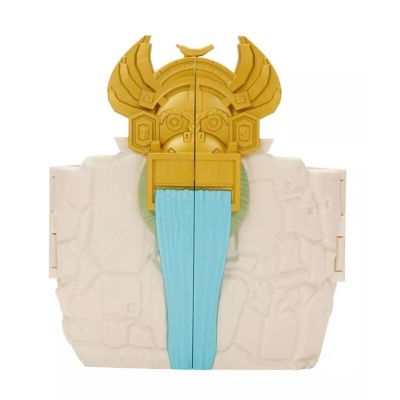 Objeto decorativo com cabeça estilizada dourada e língua azul sobre base branca texturizada