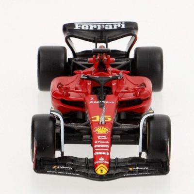 Miniatura de carro de Fórmula 1 Ferrari vermelho com patrocínios visíveis
