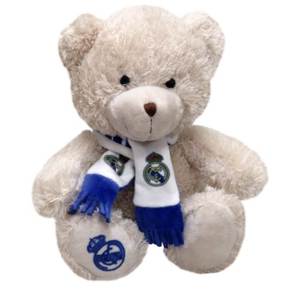 Urso de peluche castanho claro com cachecol branco e azul do Real Madrid
