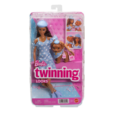 Boneca Barbie com vestido azul às bolinhas e cãozinho na embalagem transparente