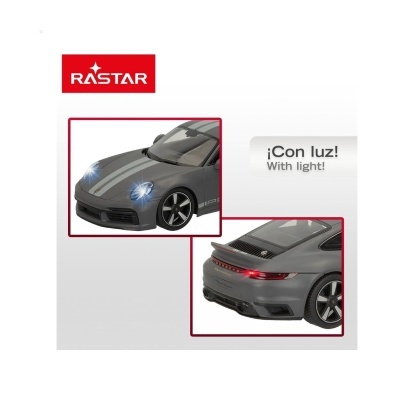 Carro de brinquedo cinzento com luzes acesas e texto RASTAR