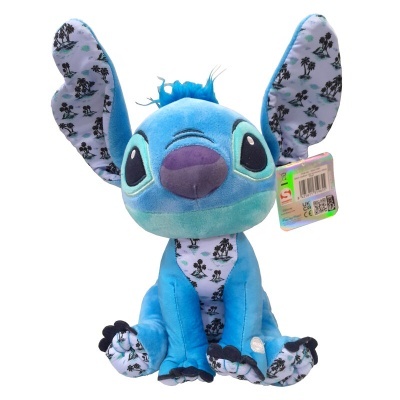 Pelúcia azul do Stitch com estampas de Mickey Mouse nas orelhas e barriga