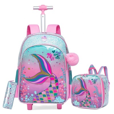 Conjunto escolar infantil rosa com estampa de cauda de sereia e pompom