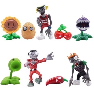 Figuras de ação de plantas e zumbis do jogo Plants vs. Zombies, feitas de plástico colorido.