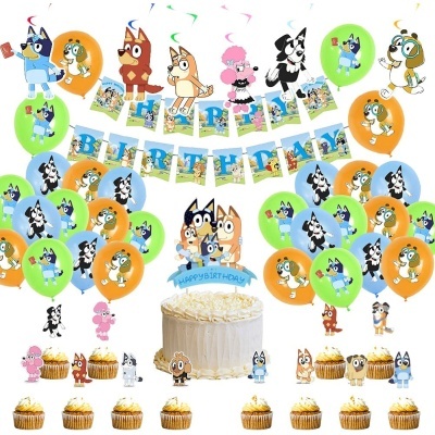 Decoração de festa de aniversário com balões coloridos, letras de feliz aniversário, bolo e cupcakes decorados com personagens de desenho animado.