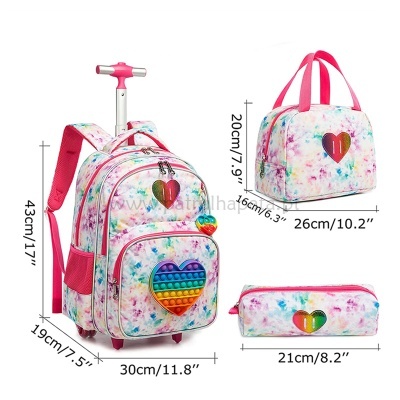 Mochila com rodas, bolsa e estojo coloridos com padrão de manchas e corações
