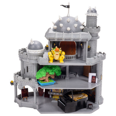 Castelo de brinquedo cinzento com torre, figuras e piano
