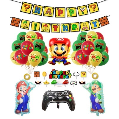 Decoração de aniversário Super Mario com balões temáticos, faixa HAPPY BIRTHDAY e elementos inspirados em videojogo.