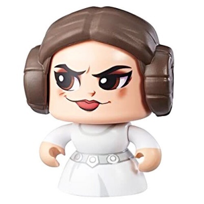 Figura de vinil com vestido branco e cabelo castanho em dois rolos laterais