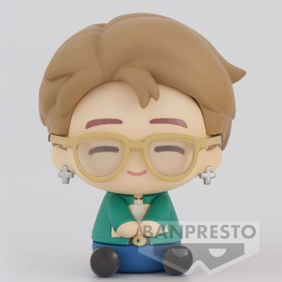 Figura de vinil chibi com óculos amarelos e camisa verde