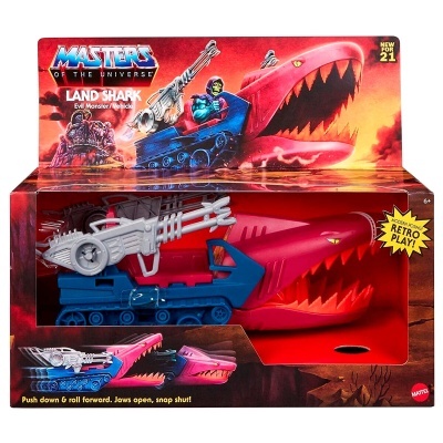 Brinquedo Land Shark Masters of the Universe azul e vermelho com embalagem colorida