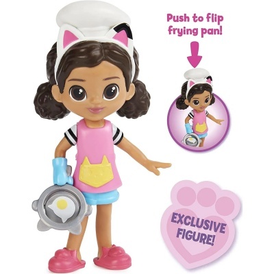 Figura infantil em plástico com vestido rosa e frigideira com ovo de brinquedo