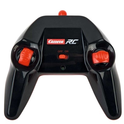 Comando preto com botões vermelhos e etiqueta Carrera RC