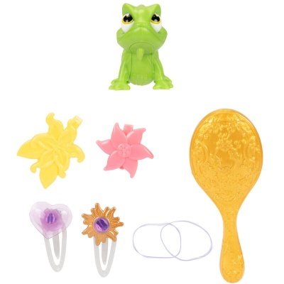 Conjunto infantil com escova amarela, elásticos, grampos coloridos e brinquedo rã verde