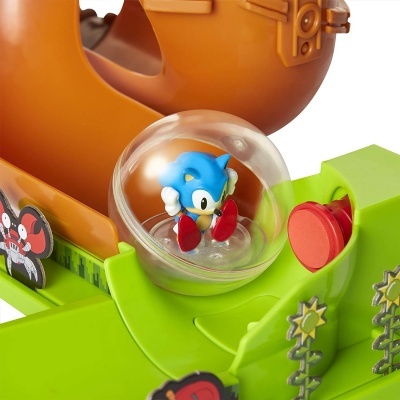 Brinquedo de Sonic com figura em cúpula transparente e base verde