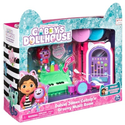 Brinquedo Gabby's Dollhouse com piano verde e figuras coloridas embalado
