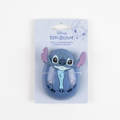 Escova desembaraçadora azul com imagem de Stitch em embalagem de cartão branco