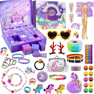 Conjunto de acessórios e brinquedos coloridos com tema de unicórnios e arco-íris, incluindo caixa com gavetas, óculos, tiaras e pulseiras